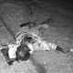 A body lays in a Santo Domingo street, showing the savagery of the fighting in the Dominican Republic civil war, 1965